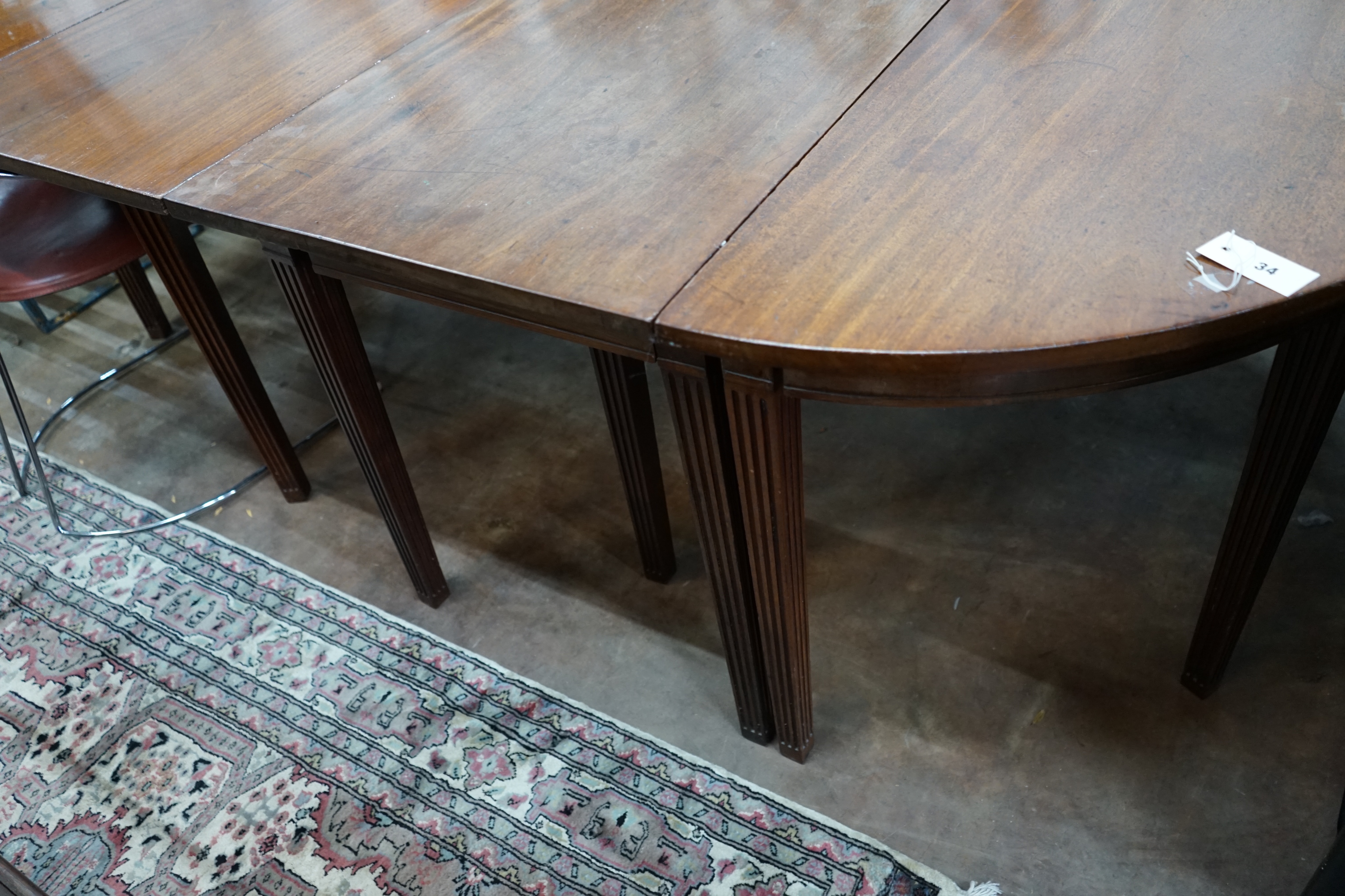 A George III mahogany D end extending dining table, extended 221cm width 132cm height 72cm